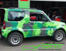 Suzuki Jimny Limousine mit THE BOSS 200cm V-Pflug und TGS600 Heckanbaustreuer