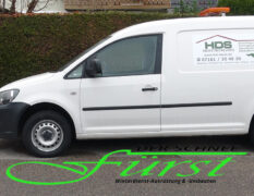 VW Caddy mit THE BOSS 185cm Schneeschild und LEHNER Polaro 170 Liter Heckanbaustreuer